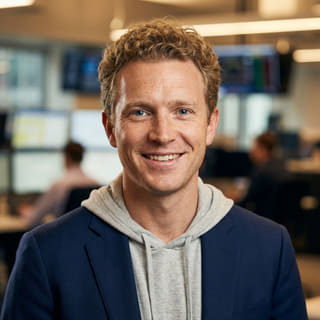 Lead Trading Analyst bei AurisFin, Ryan Brooks
